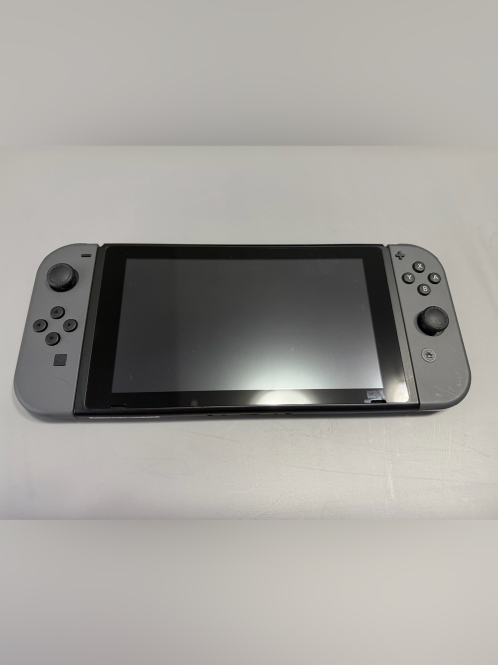 Nintendo Switch Gray Handheld Console with Joy-Con and Bag